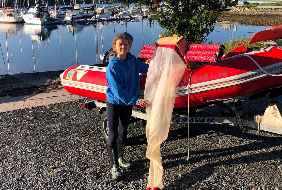 Léa Kirchhoff with a device used to sample microplastics in the ocean.