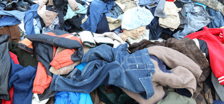 Large pile of assorted clothing