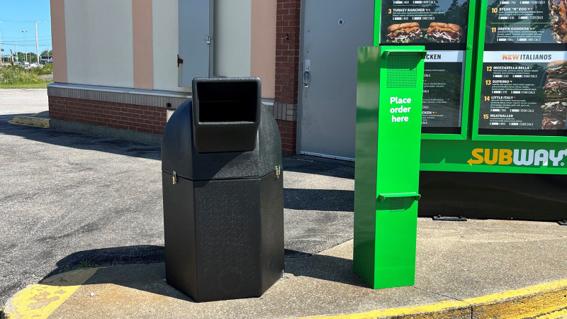 Subway drive-thru with garbage bin