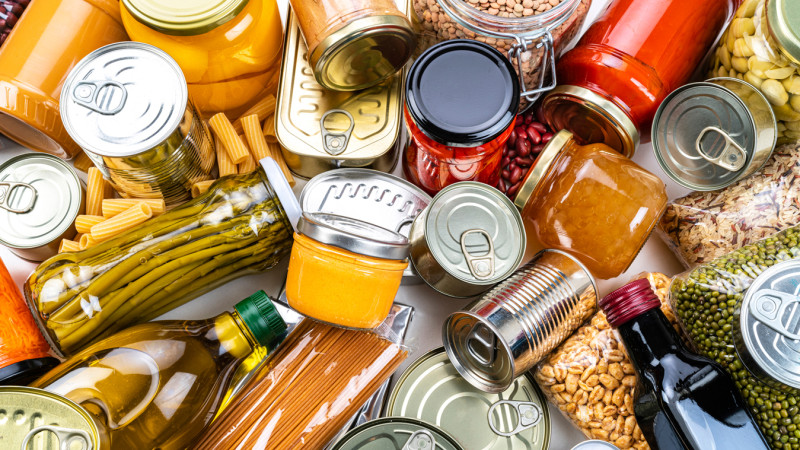 Image of assorted containerized food such as cans and jars