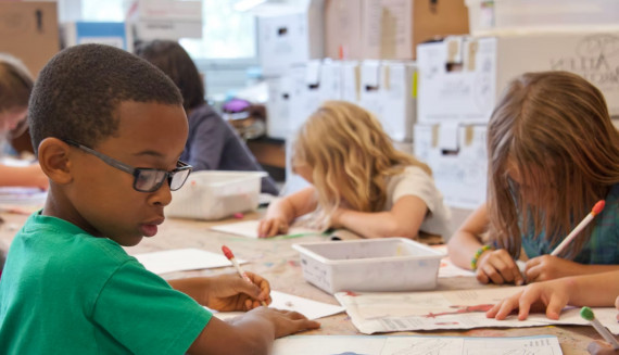 children learning in a classroom