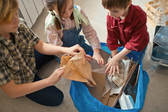 Kids sorting recycling